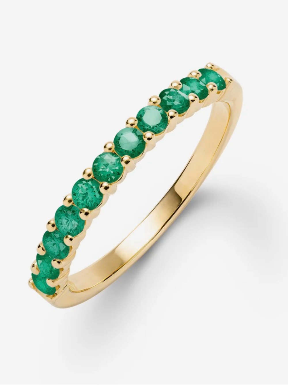 Gold Band Ring with Green Gemstone Accents